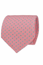 Cravatta in seta stampata rosa con micro pattern floreale grigio e bianco