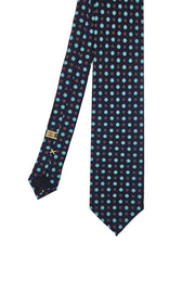 Cravatta stampata blu con pattern micro floreale acquamarina e bianco