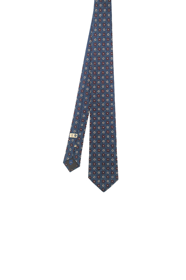 Blue jacquard tie in pure silk with white and red flowers