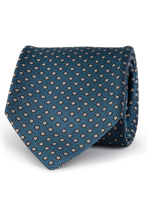 Blue jacquard tie with classic micro motif embroidery