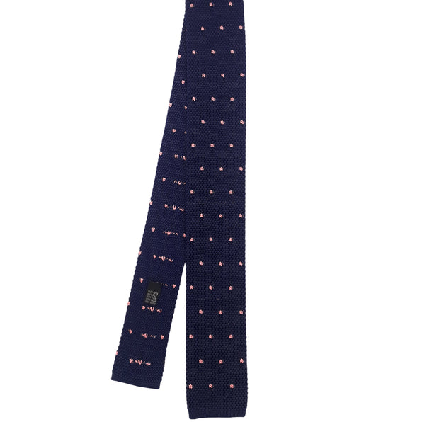 blue knitted tie and pink dots