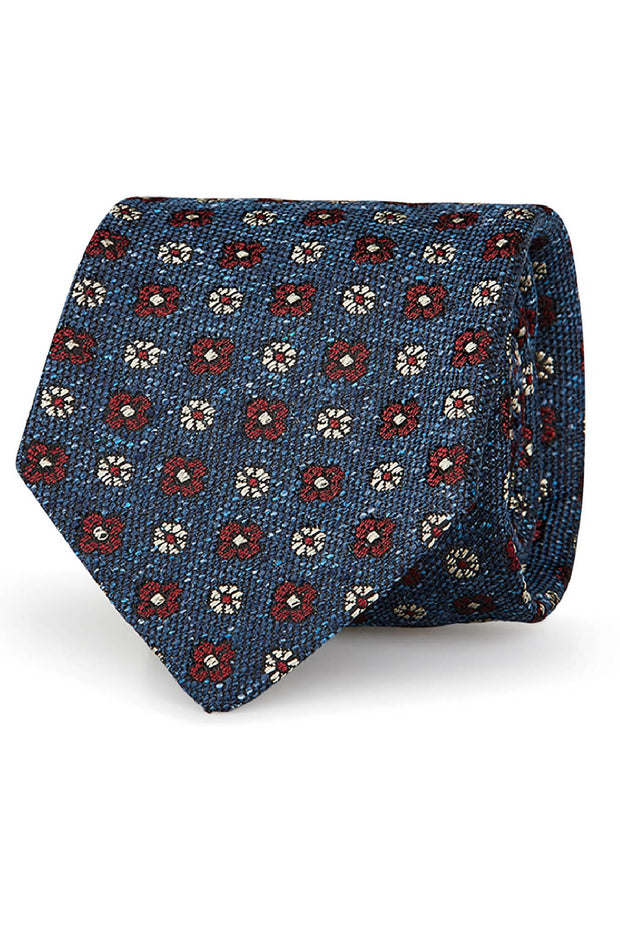 Cravatta blu jacquard in pura seta con fiori bianchi e rossi  - Fumagalli 1891