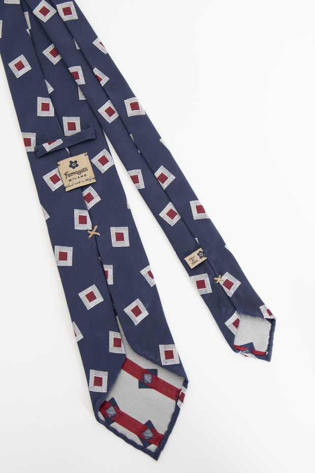 Cravatta jacquard sfoderata con motivo classico vintage blu, bianco e rosso - Fumagalli 1891