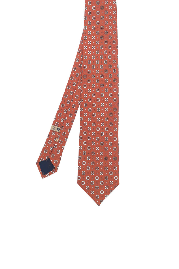 Red tie printed with classic white motif
