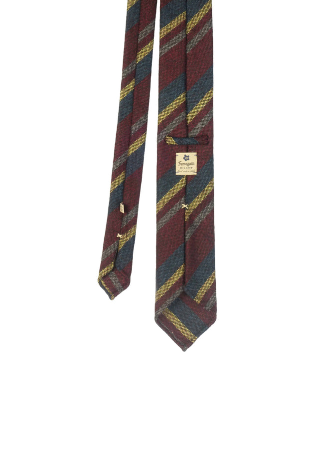 Cravatta sfoderata donegal fatta a mano con righe assimetriche rosso scuro, gialle, blu e grigie - Fumagalli 1891