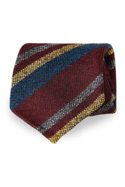 Dark red, yellow,blue & grey asymmetric striped donegal unlined hand made tie