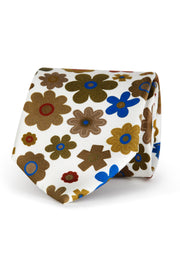 Limited series silk tie with beige stylized flowers print on a white background