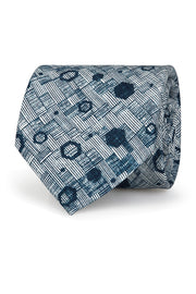 Cravatta stampata bianca in pura seta con texture geometrica blu 