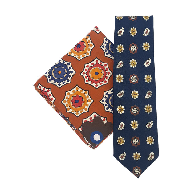 combination of blue tie and orange pocket square