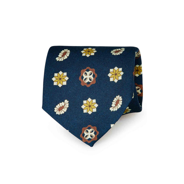 Blue floral and paisley tie and orange pocket square set