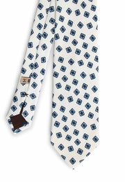 front of the tie with little blue square and white background