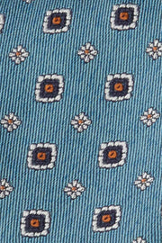 Cravatta in seta azzurra con piccoli medaglioni e fiori - Fumagalli 1891   