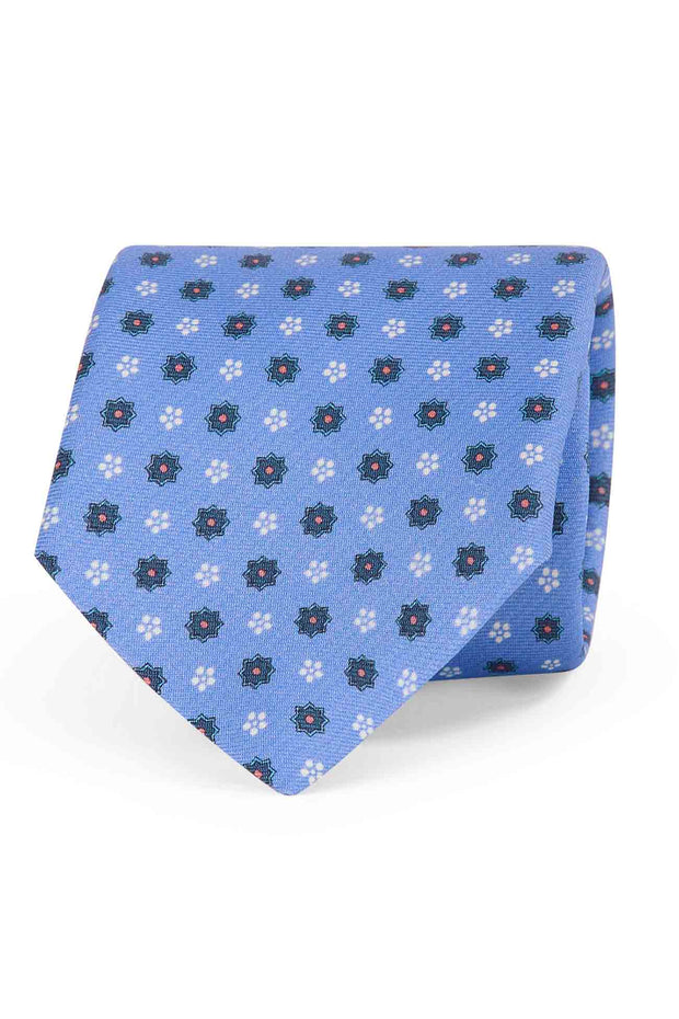 Cravatta stampata azzurra con pattern micro floreale blu e bianco - Fumagalli 1891