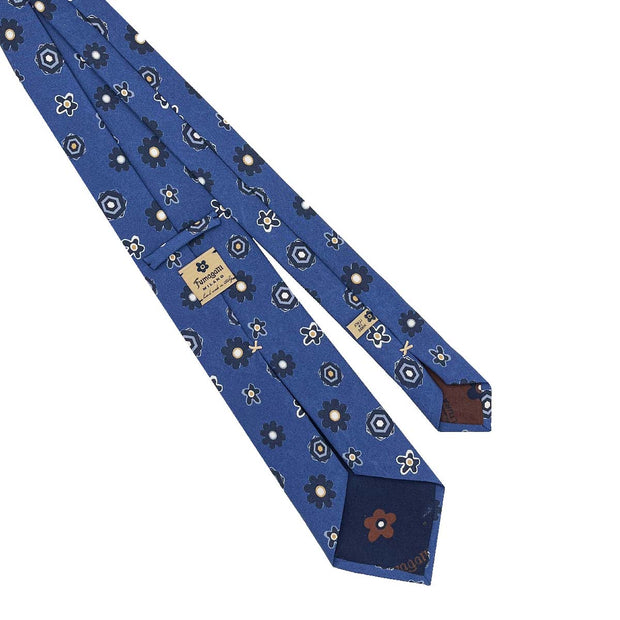 back of a blue floral and diamonds vintage luxury italian sartorial tie
