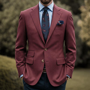 Cravatta di seta blu scuro jacquard con medaglioni e paisley rossi
