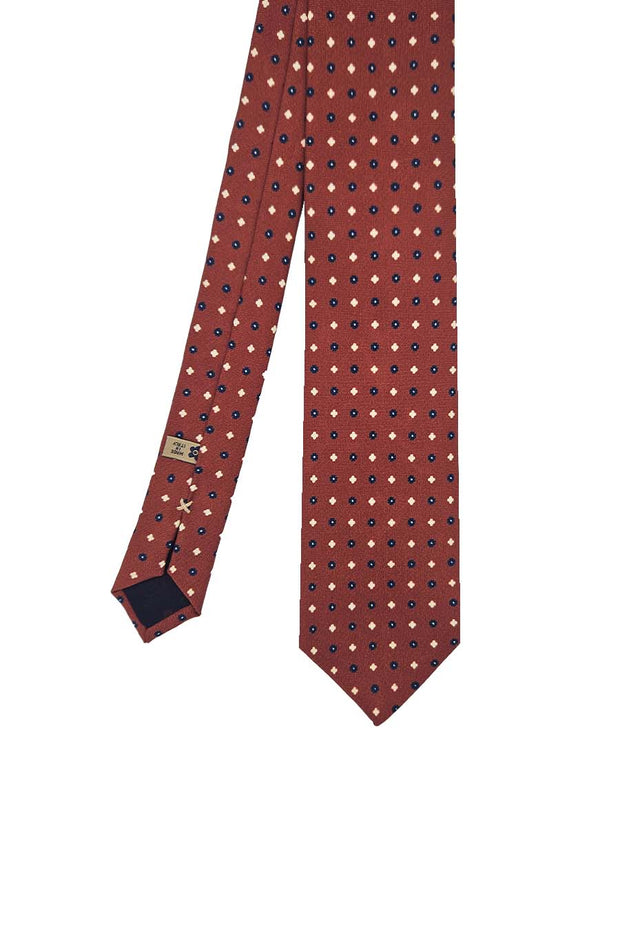 Cravatta in seta rosso mattone con stampa micro floreale 