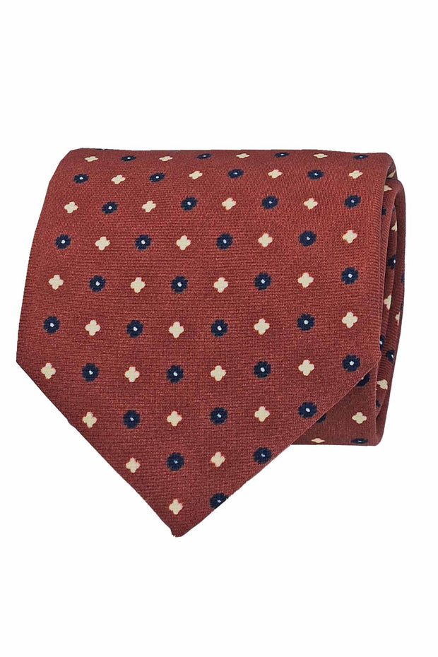 Cravatta in seta rosso mattone con stampa micro floreale 