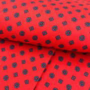 Ascot rosso con design micro floreale blu 