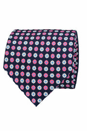 Cravatta in seta stampata blu con pattern floreale rosa e bianco
