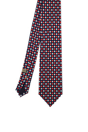 Cravatta in seta stampata blu con pattern floreale rosso e bianco