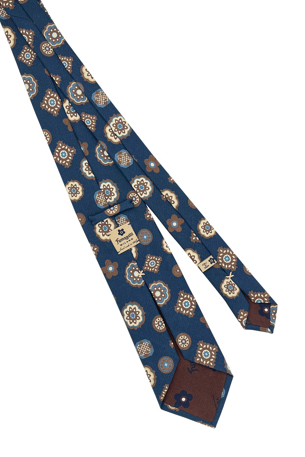 Cravatta stampata blu con fiori e pattern con diamanti geometrico in seta