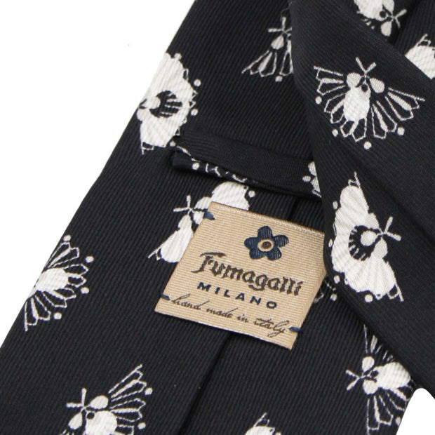 Black tie with white and beige fan