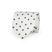 White tie with blue little flowers printed