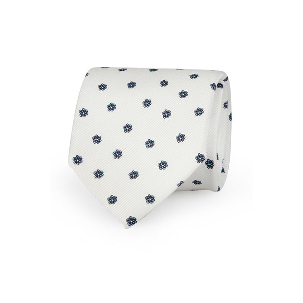 White tie with blue little flowers printed