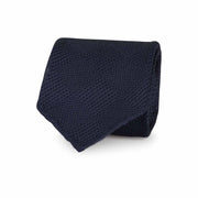 Handmade grenadine blue unlined tie made in como, italian style