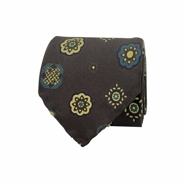Cravatta marrone sfoderata in seta con medallion stampati