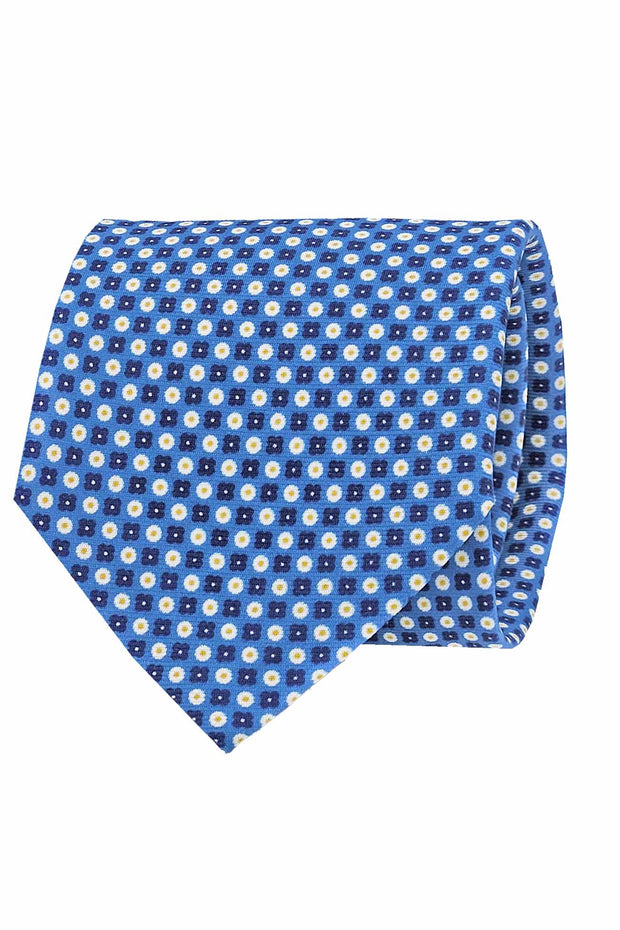 Cravatta azzurra in seta stampata con micro-fiori blu scuro e pois bianchi