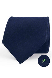 Blue silk & wool tie with four-leaf clover under the knot