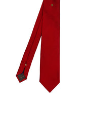 Red silk tie with four-leaf clover under the knot