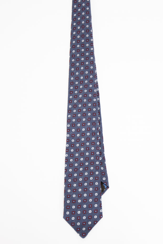 blue silk tie with vintage pattern -cravatta in seta blu con un motivo vintage
