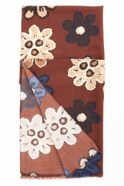 all the design of flowers on the scarf with brown and white flower