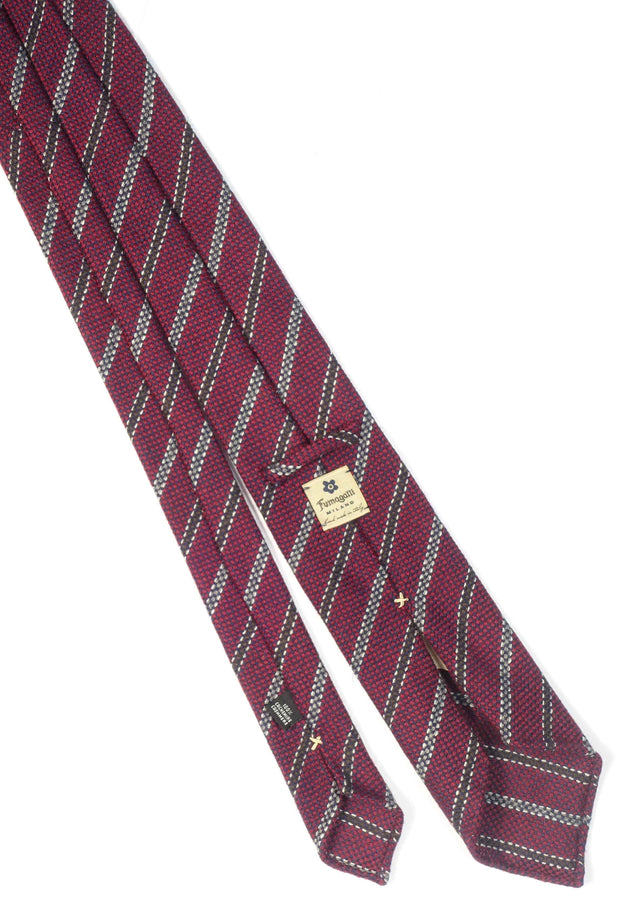 back of an italian hand made tie with little stripes