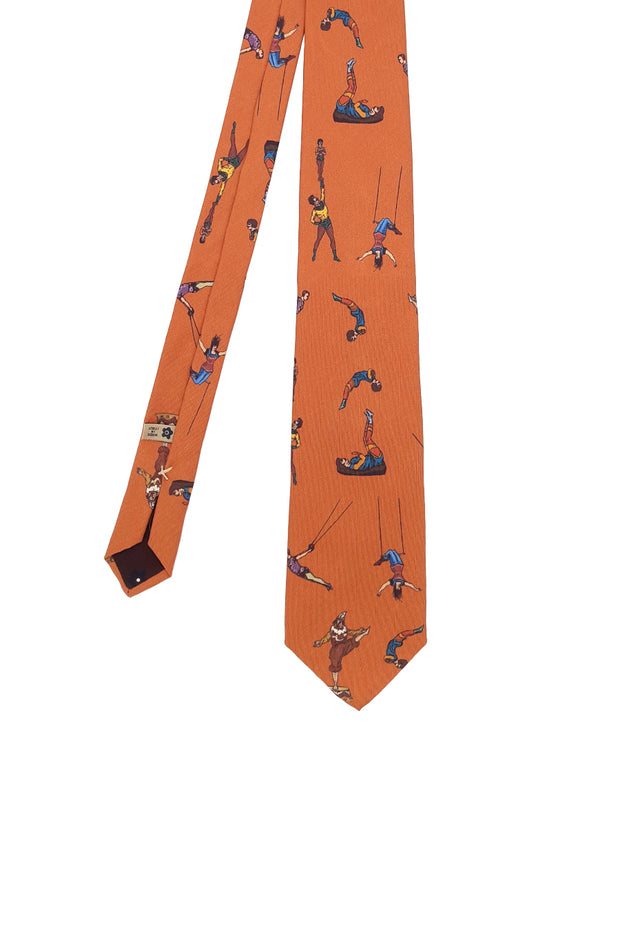 Orange silk tie with retro circus print