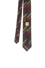 Cravatta donegal fatta a mano con righe assimetriche rosso scuro, gialle, blu e grigie - Fumagalli 1891
