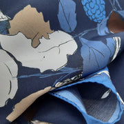 floral print on blue neckerchief