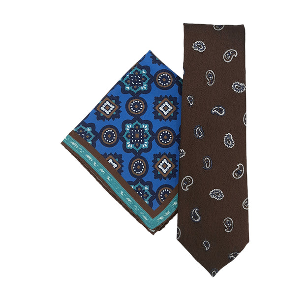 combination of brown tie and blue pocket square