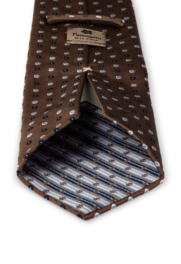 back of the brown unlined tie with diamond little pattern black & white