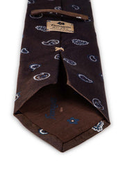 on the back of the tie there is a fumagalli label and the lining is brown with fumagalli logo