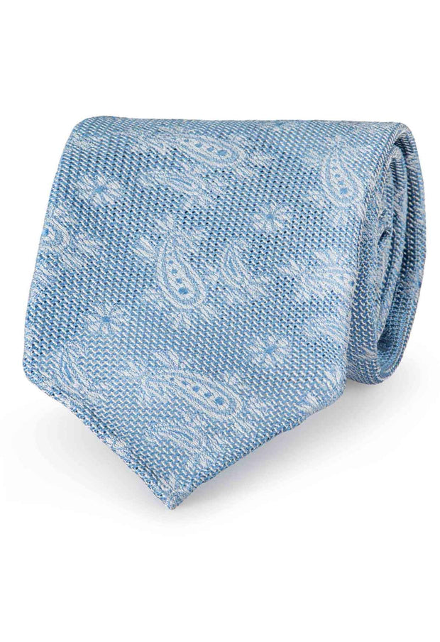 Cravatta sfoderata in garza di seta azzurra con piccoli paisey bianchi - Fumagalli 1891