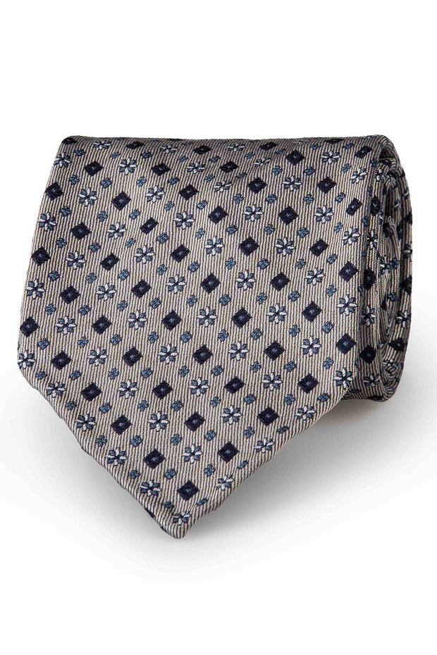 Cravatta in pura seta color grigio, blu scuro, azzurro & bianco con motivi di diamanti & fiori  - Fumagalli 1891