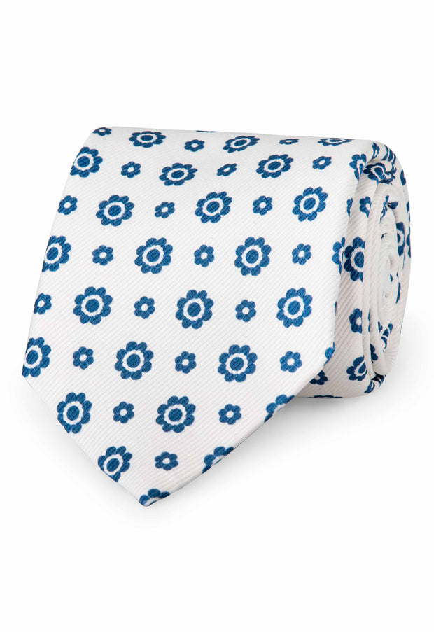 hand made printed tie with small and big floral pattern on it