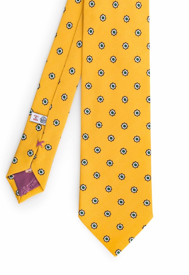 hand made yellow printed tie with floral white and green flowers