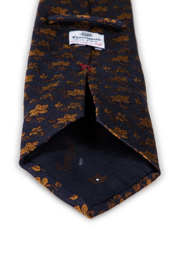 dark blue and gold flowers on a silk hand made tie