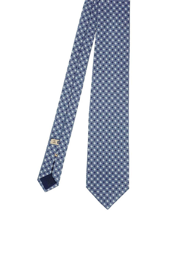 Cravatta in seta jacquard con motivo floreale blu, bianco e azzurro - Fumagalli 1891