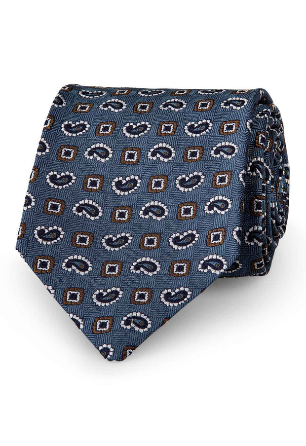 handmade tie with little brown, white & black diamonds alternate with dark blue and white paisley
