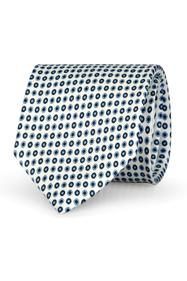 white tie with blue and light blue dots